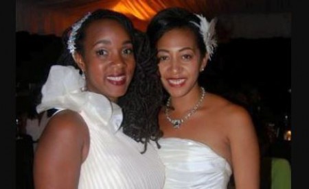 Image: Danielle and Aisha at their wedding ceremony; Source: Essence