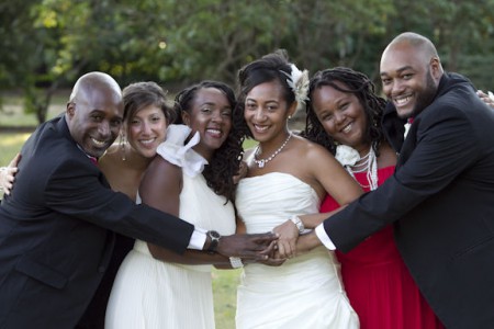Danielle Moodie and Aisha Mills at their wedding; Source: Essence