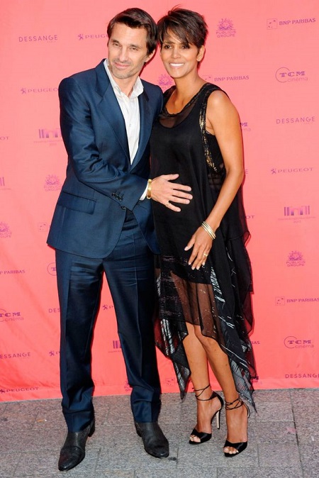 Halle Berry and Olivier Martinez showing baby bump. Halle conceived before marrying Oliver.