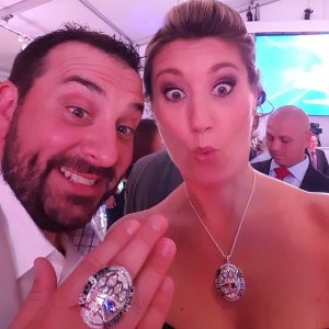 Matt Patricia (left) and his wife Raina Patricia (right) showing his super bowl ring