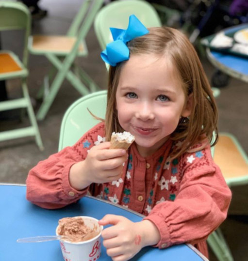 Emily's daughter, Sloan eating icecream