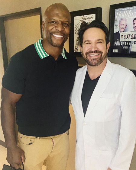 Dr. Kevin Sands with his patient, Terry Crews at Kevin Sands DDS, INC