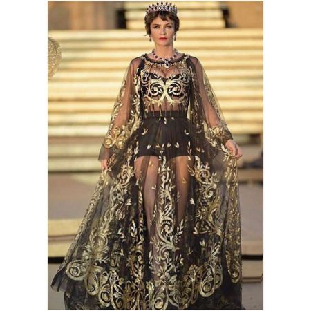 Helena Christensen wearing Dolce & Gabbana's dress