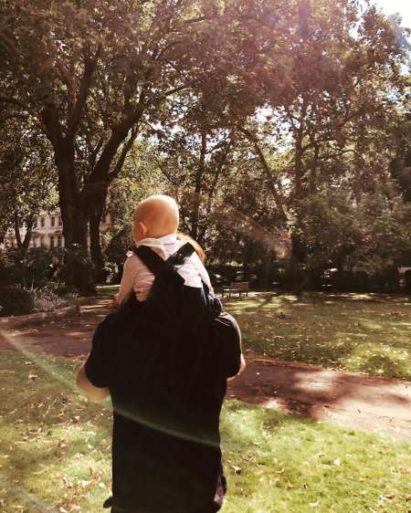 Diane Kruger carrying her son, Mingus Lucien in her back