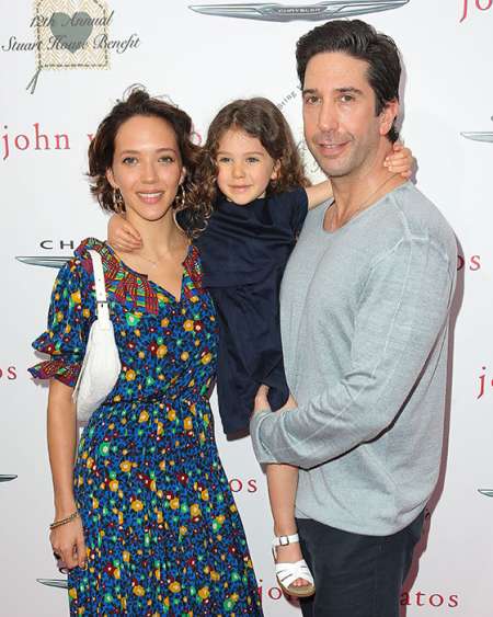 Carla Alapont and his wife, Zoe Buckman with their daughter, Cleo
