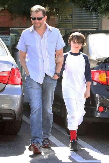 Charlie Austin Cryer with his father, Jon Cryer walking