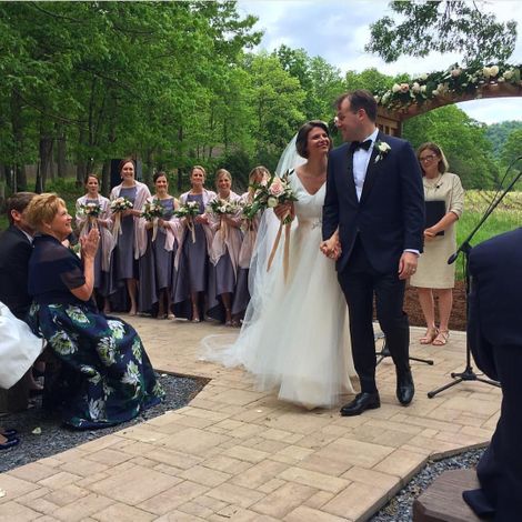 At their wedding, Kasie Hunt and Matthew Mario Rivera.