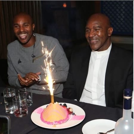 Evander Holyfield with his son Evander Holyfield Jr. at his birthday