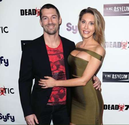 Chloe Rose Lattanzi with her partner, James Driskill at the premiere of Syfy's Dead 7