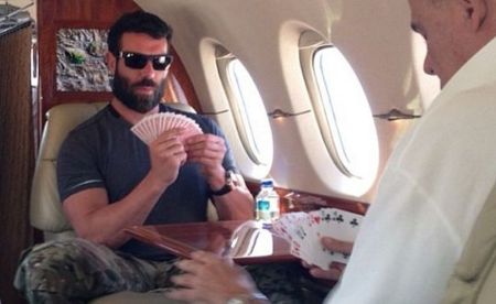 Dan Bilzerian playing poker in a private jet