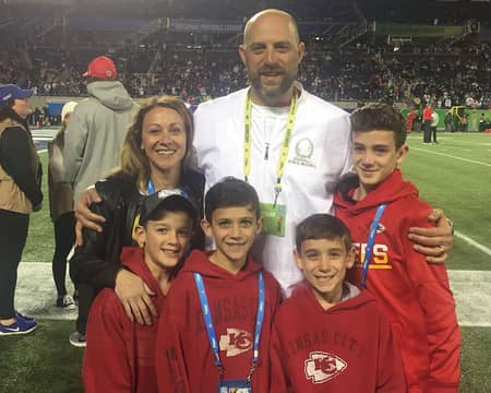 Matt Nagy and Stacey Nagy with their four children posing after the NFL match