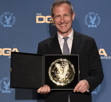 The director of commerical, Dream It from squarespace, Spike Jonze holding his DGA award