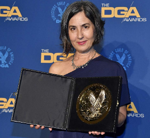 Amy Schatz receiving her award on 72nd DGA Awards