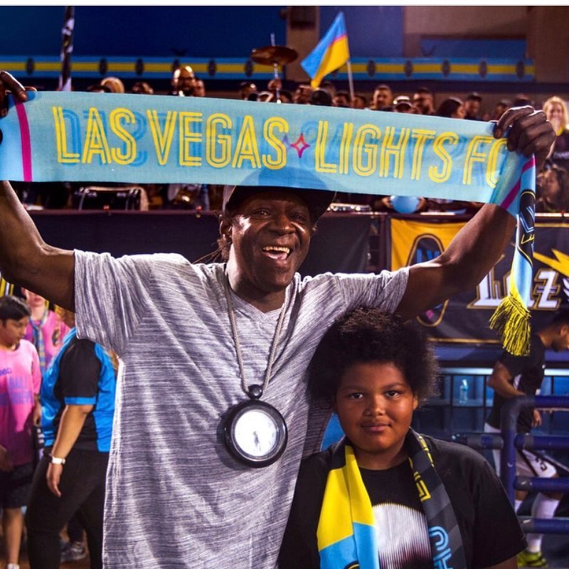 Flavor and his son supporting Las Vegas Lights Team