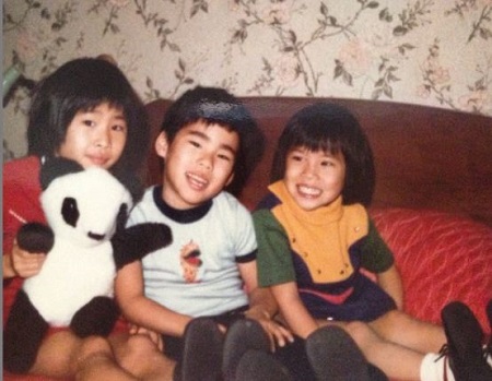  The childhood image of Lucy Liu (right) with her elder brother John and sister Jenny Liu.