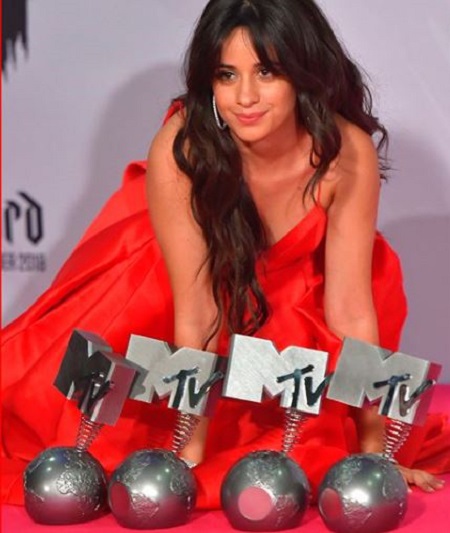  The Cuban/American singer Camila Cabello poses with her MTV Music Awards.