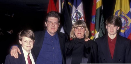 The childhood image of James Hughes (left) with his parents John Hughes (father), Nancy Ludwig Hughes (mother), and elder brother John Hughes III (right).