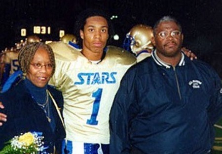 Larry Fitzgerald Jr (middle) pictures with his mother late. Carol and father Larry Fitzgerald Sr.