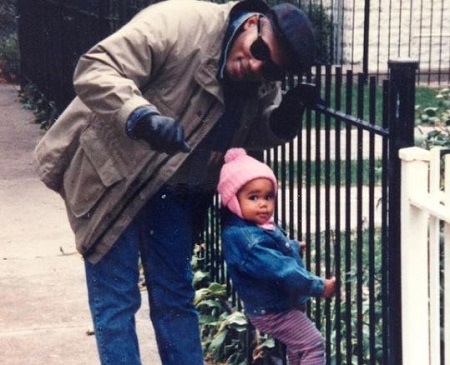 The childhood image of Laura Harrier with her father Temujin Harrier.