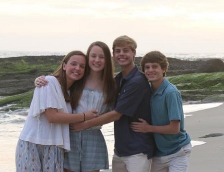Jordan Ashley (left) with her biological sister Alexa Marie (second from left) and half-brothers Luke (right), Val Mooty (second from right).