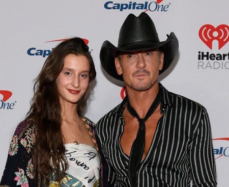 The celebrity daughter Audrey Caroline McGraw pictures with her father Tim McGraw.