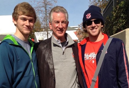 Tucker (right) pictured with his father, Tommy, and brother, Troy Allen Tuberville (left)
