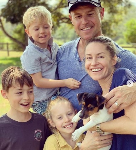 Rodger Corser and Renae Berry with their kids Budd Frederick (left), Cilla June (daughter), Dustin Corser (left-upward), and their pet dog 'Eddie.''