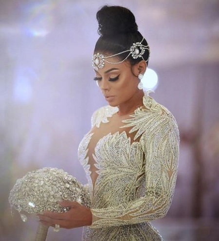 The bride Keysha Ka'Oir looks gorgeous on her embroidered wedding gown designed by Charbel Zoe.