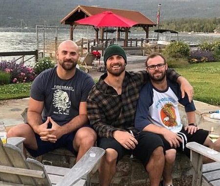 : Howard Long Jr (right) pictured with his eldest brothers Chris Long (middle) and Kyle Long (left).