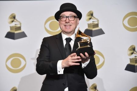 Brian Lynch holding the 2020 Grammy Award