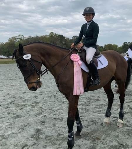 Savannah Blackstock riding her winning horse in the tournament