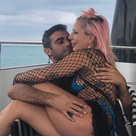 Lady Gaga sitting on her beau, Michael Polansky's lap on a yacht in Miami. Know more about the pair's new dating life.