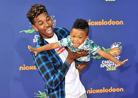 Nick Young and son Nick Young Jr. at the Nickelodeon Kids' Choice Sports Awards 2015 at UCLA's Pauley Pavilion on July 16, 2015, in Westwood, California.