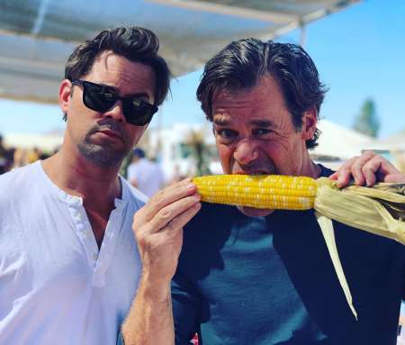 Andrew Rannells and Tuc Watkins eating corn at the Underwood Family Farms on 7th October 2019. To explore more about the gay couple's dating life, read the article. 