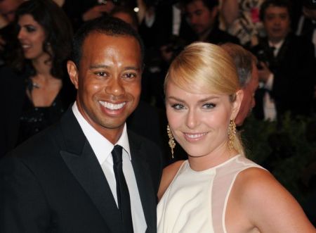 Lindsey with Tiger woods in a event