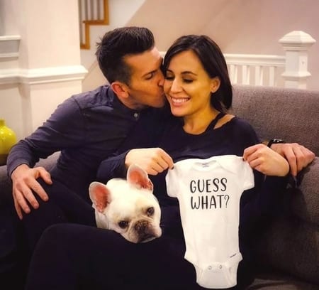 Frank Thorp and Hallie Jackson announcing her pregnancy via a Instagram photo with their pet dog.