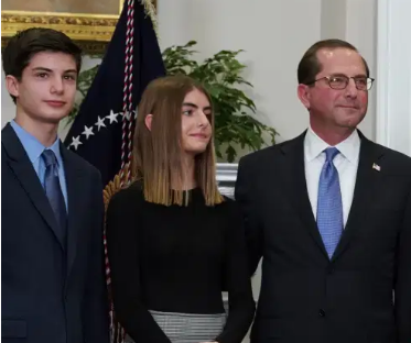 Picture: Jeniffer Azar Husband WIth Alez Azar Standing With His Children At An Event Inside The WHite House