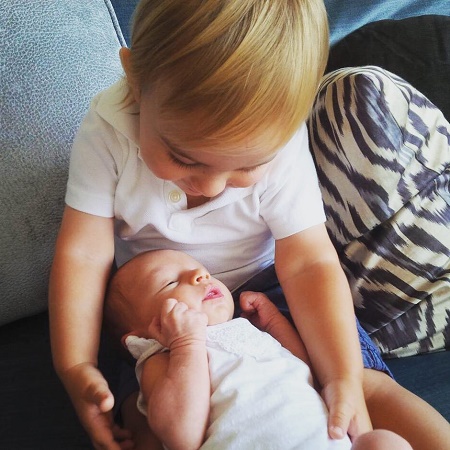 Erin's son with new born sibling