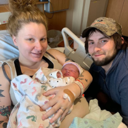Chelsea and Jacob with their newly born baby.