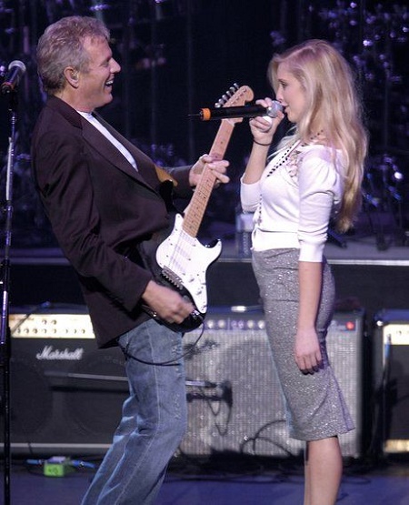 Susan Felder's Daughter Leah Jenner and husand, Don Felder performing at a same stage