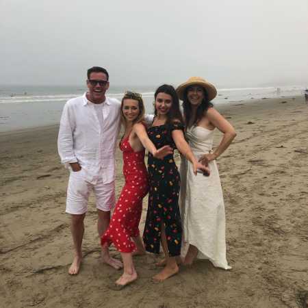 Bruce Somers Jr. and his wife, Caroline Somers with their two daughters on the beach side. How is Bruce and Caroline's married life going?