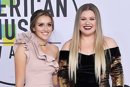 Kelly Clarkson and Savannah Blackstock attends American Music Awars in 2017