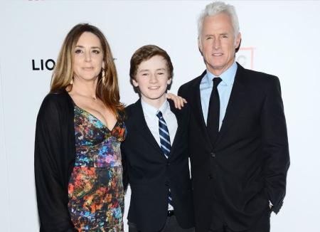 Talia Balsam and her husband, John Slattery with their son, Harry Slattery. Explore more about John and Talia's wedding details.