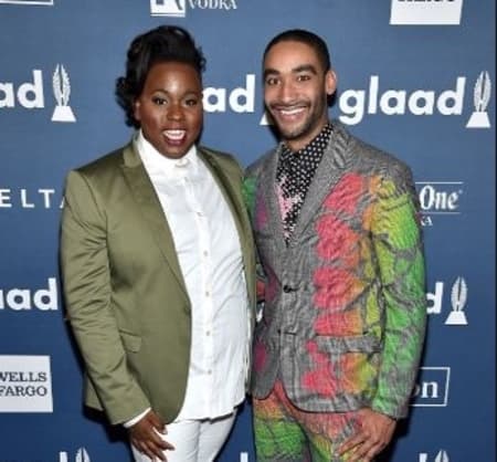 Alex with his boyfriend Zeke Thomas at an event
