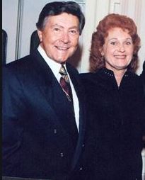 Johnny Gilbert And His Wife Sheree Gilbert At An Press Party