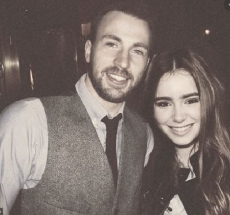 Lily Collins with actor, Chris Evans