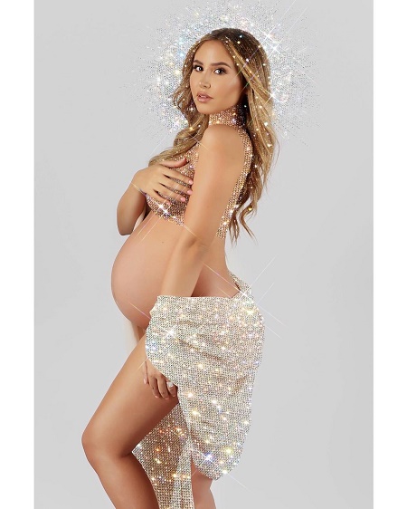 The 1.68 m tall, Catherine Paiz is expecting a boy.