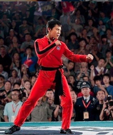 Zhenwei Wang as Cheng in The Karate Kid