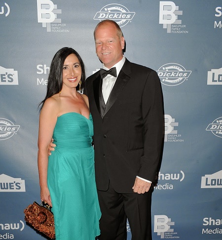 Mike Holmes, a Businessman with his longterm Girlfriend, Anna Zapia