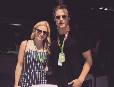 The actor Sam Heughan with an actress Mackenzie Mauzy.